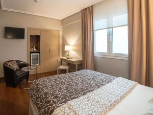 Posteľ alebo postele v izbe v ubytovaní Mercure Monte Igueldo