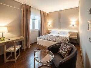 Posteľ alebo postele v izbe v ubytovaní Mercure Monte Igueldo
