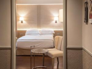 Posteľ alebo postele v izbe v ubytovaní Mercure Monte Igueldo