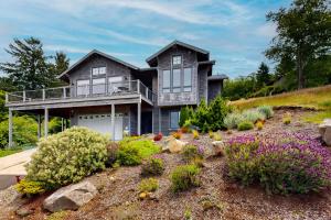 a house on a hill with a garden at Alta Vista in Pacific City
