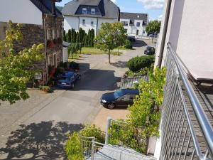 a car parked on a street next to a building at Am Weinberg in Bernkastel-Kues
