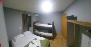 Postel nebo postele na pokoji v ubytování Pousada Praia do Trapiche