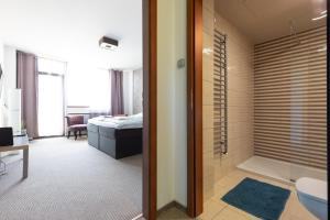 Postel nebo postele na pokoji v ubytování Prince apartment downtown + 7 fotografií