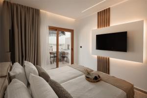 TV a/nebo společenská místnost v ubytování Hotel Sphinx
