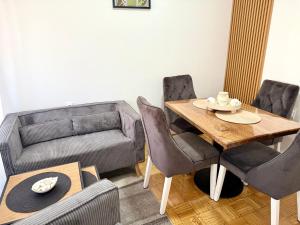 Posezení v ubytování Maribelle Apartments