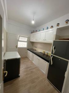 Köök või kööginurk majutusasutuses Cozy Condo in Rabat
