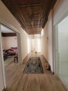 Voodi või voodid majutusasutuse Cozy Condo in Rabat toas