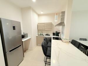 Kuchyň nebo kuchyňský kout v ubytování Minissy luxury Serviced Apartment