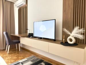 TV a/nebo společenská místnost v ubytování Maribelle Apartments