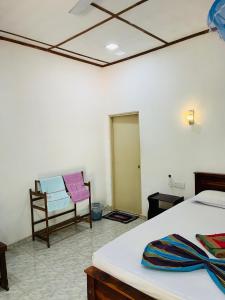 Postel nebo postele na pokoji v ubytování Horizon Resort & Hostel Sigiriya