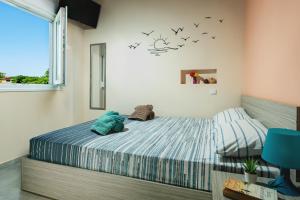 Postel nebo postele na pokoji v ubytování Costa Petra - Luxury Seaside Cottage with Garden - Vacation House for families in Greece