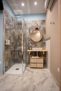 a bathroom with a shower and a sink at Experience Napoli Center in Naples +84 photos