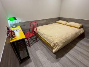 Postel nebo postele na pokoji v ubytování Formosa 101 Taipei Main Branch