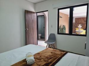 Voodi või voodid majutusasutuse Hotel Fuente Real Popayán toas