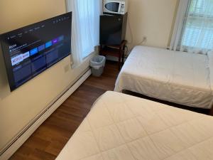 Postel nebo postele na pokoji v ubytování Cappuccio Hotel