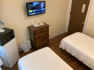 Postel nebo postele na pokoji v ubytování Cappuccio Hotel