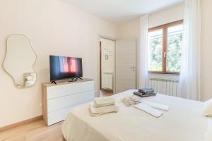 Ένα ή περισσότερα κρεβάτια σε δωμάτιο στο The small lemon garden