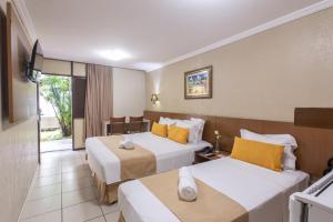 TV a/nebo společenská místnost v ubytování Amuarama Hotel