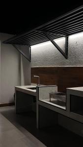 a large kitchen with a sink and a sink at Altara Villa's in Ḩayl Yaman +5 photos