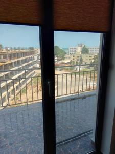 a view from the window of a building at Seven Apartament in Mangalia +3 photos