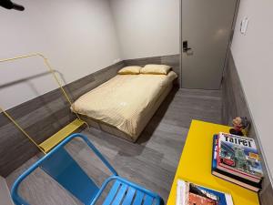 Postel nebo postele na pokoji v ubytování Formosa 101 Taipei Main Branch
