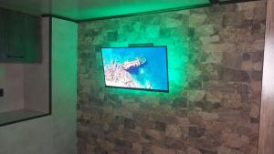 TV a/nebo společenská místnost v ubytování DavAnEd