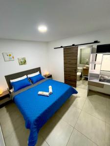 Voodi või voodid majutusasutuse Hotel Fuente Real Popayán toas