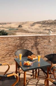 Posezení v ubytování Royal Scarab Pyramids Hotel