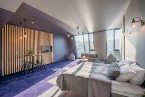 Cama ou camas em um quarto em Urbihop Hotel