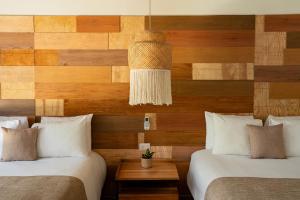 Letto o letti in una camera di Mayan Monkey Cancun - Social Hotel