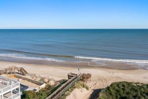 an aerial view of the beach and the ocean at Sailors Cove in Corolla