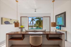 TV a/nebo společenská místnost v ubytování Marea Beachfront Villa H48 + 9 fotografií