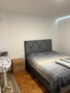 Ένα ή περισσότερα κρεβάτια σε δωμάτιο στο Apartman Ksenija