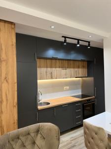 Η κουζίνα ή μικρή κουζίνα στο Apartman Ksenija