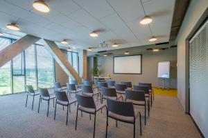 Área de negócios e/ou sala de conferências em Urbihop Hotel