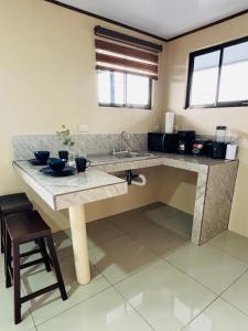 Kuchyň nebo kuchyňský kout v ubytování Hotel Nativo Arenal + 19 fotografií