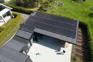 an overhead view of a house with solar panels on it at Blackrock in Varberg