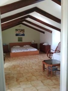Ένα ή περισσότερα κρεβάτια σε δωμάτιο στο Stamatina's House