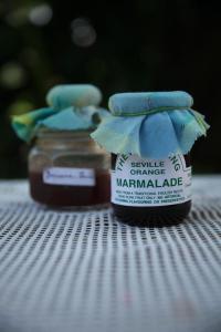 a jar of gentle change marmalade sitting on a table at The School Estate in 100 Acres in Siddapur