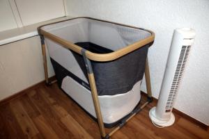 a container sitting on the floor next to a heater at Ferienhaus Domus in Xanten