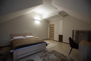 Postel nebo postele na pokoji v ubytování Premiera cottage