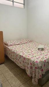 Postel nebo postele na pokoji v ubytování Pousada e Alojamento Engenho de Itaguaí