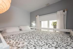 Posteľ alebo postele v izbe v ubytovaní Divi Apartments Valvanera