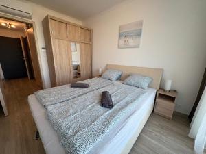 Posteľ alebo postele v izbe v ubytovaní Seaforth Apartment