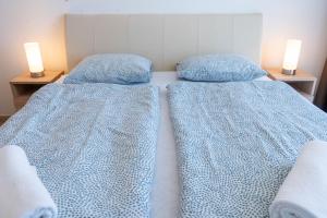 Posteľ alebo postele v izbe v ubytovaní Seaforth Apartment