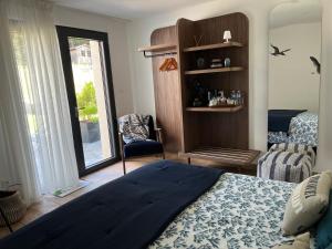 Postel nebo postele na pokoji v ubytování Art de l'Ô chambre d'hôtes