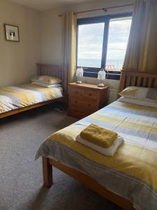 Katil atau katil-katil dalam bilik di Gairloch View Bed & Breakfast
