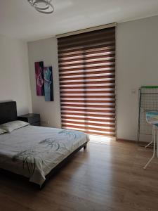 Krevet ili kreveti u jedinici u okviru objekta Nice flat