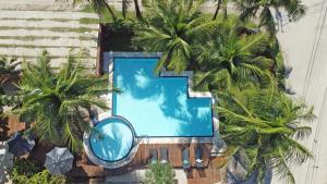 A piscina localizada em Pousada Toca da Praia ou nos arredores
