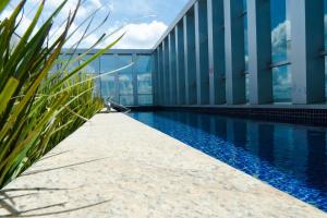 Πισίνα στο ή κοντά στο V909 Flat bem espaçoso com varanda vista Esplanada +10 φωτογραφίες